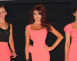 Celebrity fashion: Amy Childs launched her Spring/Summer 2012 clothing collection, including this summery pink and black optical illusion dress. We love the bright colour and can picture it with sky-h