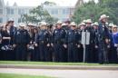 Policemen arrive at the funeral for Harris County Deputy Darren Goforth, in Houston