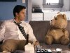 This film image released by Universal Pictures shows Mark Wahlberg, left with the character Ted, voiced by Seth MacFarlane in a scene from "Ted." (AP Photo/Universal Pictures)
