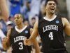 Lehigh's John Adams (4) and C.J. McCollum (3) celebrate after winning an NCAA tournament second-round college basketball game against Duke in Greensboro, N.C., Friday, March 16, 2012. Lehigh won 75-70. (AP Photo/Gerry Broome)