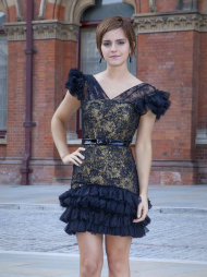 British actress Emma Watson poses at St Pancras Renaissance Hotel in central London, ahead of the world premiere of Harry Potter and The Deathly Hallows: Part 2, the last film in the series, Wednesday, July 6, 2011. (AP Photo/Joel Ryan)