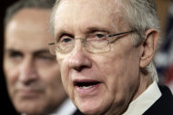 Senate Majority Leader Harry Reid of Nev., right, joined by Sen. Charles Schumer, D-N.Y, speaks during a news conference on Capitol Hill in Washington, Friday, July 29, 2011. (AP Photo/J. Scott Applewhite)