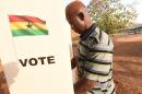 A man casts his vote in the presidential election in Bole district, northern Ghana, on December 7, 2016