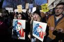 People chant during a rally protesting the immigration policies of President Donald Trump, near the White House in Washington, Saturday, Feb. 4, 2017. (AP Photo/Manuel Balce Ceneta)