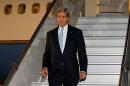Secretary of State John Kerry arrives in Geneva, Wednesday, April 16, 2014, where he is scheduled to participate in talks on the ongoing situation in Ukraine with representatives from Ukraine, Russia and the European Union. (AP Photo/Jim Bourg, Pool)
