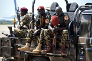 South Sudan's soldiers sit on a truck at the airport …