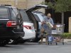 Unidentified shoppers unload their shopping cart at a Pembroke Pines, Fla. Costco store Thursday, Sept. 29, 2011. The Commerce Department said Friday, Sept. 30, 2011 that consumer spending rose 0.2 percent in August after a revised 0.7 percent increase in July.   (AP Photo/J Pat Carter)