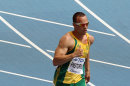FILE - This Aug. 28, 2011 file photo shows South Africa's Oscar Pistorius competing in a heat of the men's 400-meter at the World Athletics Championships in Daegu, South Korea. The South African double amputee is going to the London 2012 Olympics, re-igniting the fierce debate over the carbon fiber blades he runs on and his right to compete alongside able-bodied athletes. (AP Photo/Kevin Frayer, File)
