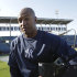 New York Yankees outfielder Vernon Wells  heads to the dugout after signing with the Yankees and taking batting practice before the baseball team's spring training game against the Houston Astros at Steinbrenner Field in Tampa, Fla., Tuesday, March 26, 2013. (AP Photo/Kathy Willens)