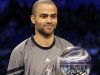 San Antonio Spurs' Tony Parker (9) holds the NBA All-Star Skills Challenge basketball competition trophy after winning the event in Orlando, Fla., Saturday, Feb. 25, 2012. (AP Photo/Lynne Sladky)