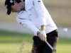 Rory McIlroy from Northern Ireland plays a ball on the 10th hole during the first round of Abu Dhabi HSBC Golf Championship in Abu Dhabi, United Arab Emirates, Thursday, Jan. 26, 2012. (AP Photo/Kamran Jebreili)