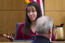 FILE - In this March 7, 2013 file photo, Jodi Arias answers written questions from the jury in Maricopa County Superior Court in Phoenix during her trial for the 2008 killing of her boyfriend, Travis Alexander. Psychologist Richard Samuels, who diagnosed Arias with post-traumatic stress disorder and amnesia, returns to the witness stand for a sixth day of testimony Monday, March 25, 2013. (AP Photo/The Arizona Republic, Tom Tingle, Pool, File)