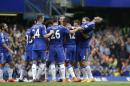 Chelsea's Didier Drogba, top right, is carried off by his teammates as a mark of respect as he is substituted off in what is expected to be his last game for the club during the English Premier League soccer match between Chelsea and Sunderland at Stamford Bridge stadium in London, Sunday, May 24, 2015. (AP Photo/Matt Dunham)
