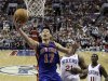 New York Knicks' Jeremy Lin (17) shoots as Philadelphia 76ers' Thaddeus Young (21) and Jrue Holiday (11) trail during the first half of an NBA basketball game, Wednesday, March 21, 2012, in Philadelphia. (AP Photo/Matt Slocum)