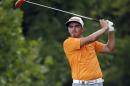 Rickie Fowler watches his tee shot on the fourth hole during the final round of the PGA Championship golf tournament at Valhalla Golf Club on Sunday, Aug. 10, 2014, in Louisville, Ky. (AP Photo/Jeff Roberson)