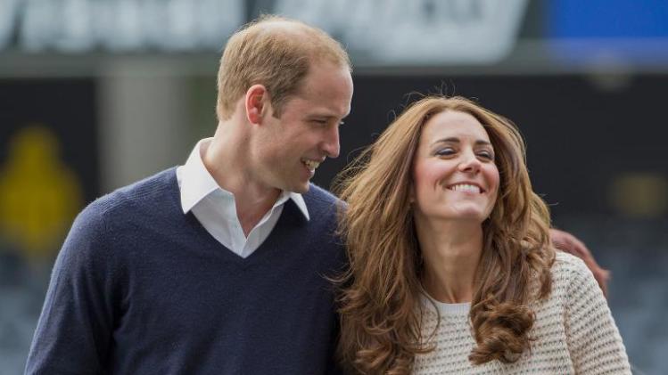 Prince William (L) and his wife Catherine, the Duchess of Cambridge, attend a children&#39;s rugby tournament during a visit to Forsyth Barr Stadium in Dunedin on April 13, 2014