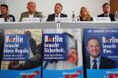 Padzerski, top candidate of the anti-immigration party AfD for the Berlin state elections, attends a news conference in Berlin