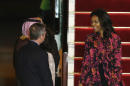 U.S. First Lady Michelle Obama arrives at the Hamad Airport in Doha, Qatar, Monday, Nov. 2, 2015. She'll visit the al-Udeid air base with comedian Conan O'Brien. She is also scheduled to give a speech Wednesday on her Let Girls Learn initiative at the 2015 World Innovation Summit for Education, sponsored by the Qatar Foundation. (AP Photo/Osama Faisal)