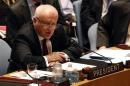 Australia's Ambassador to the United Nations Gary Quinlan speaks during the U.N. Security Council meeting on Syria in New York