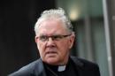 Brisbane Archbishop Mark Coleridge departs after giving evidence at the Royal Commission into Child Sexual Abuse in Sydney