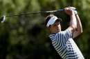 Luke Donald of England hits his tee shot on the ninth hole during the Nationwide Invitational Pro-Am at the Memorial Tournament in Dublin