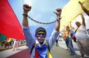 Opposition supporters take part in a march against the government of Nicolas Maduro in Caracas