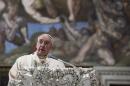 Pope Francis celebrates a solemn mass in the Sistine Chapel at the Vatican