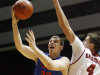 Florida forward Erik Murphy (33) drives to the basket against Alabama center Carl Engstrom (4) in the first half of an NCAA college basketball game in Tuscaloosa, Ala., Tuesday, Feb. 14, 2012. (AP Photo/Robert Sutton)