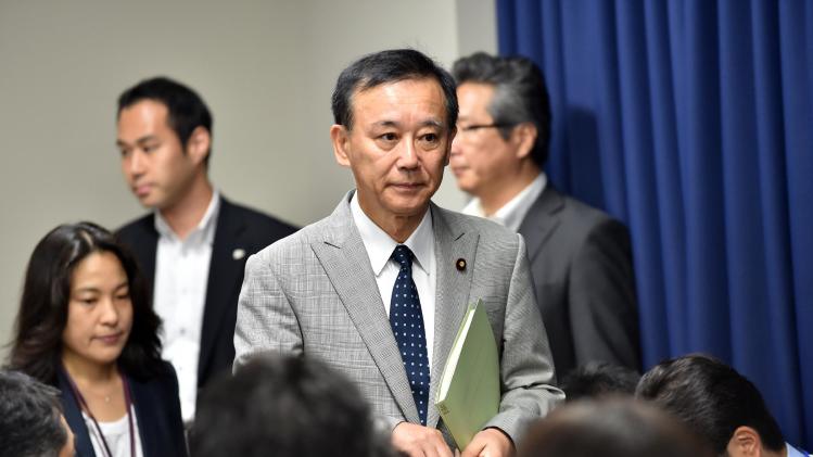 Japanese Justice Minister Sadakazu Tanigaki arrives for a press conference in Tokyo to announce the execution of a mobster and a killer arsonist, August 29, 2014