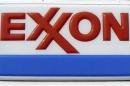 Exxon corporate logo is pictured at a gas station in Arlington