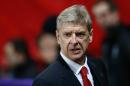 Arsene Wenger arrives for Arsenal's Champions League game against Marseille at the Emirates Stadium in London on November 26, 2013