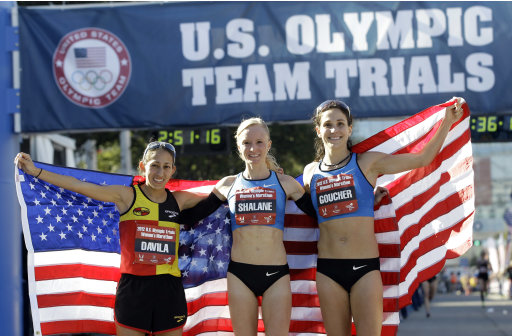 The top three women finishers, from left, Desiree Davila, second, Shalane Flanagan, first, and Kara Goucher, second, pose after running in the U.S. Olympic Trials Marathon, Saturday, Jan. 14, 2012, in Houston. (AP Photo/David J. Phillip)