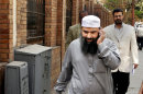 FILE -- In this file photo taken on April 11, 2007, Egyptian cleric Osama Hassan Mustafa Nasr, known as Abu Omar, who allegedly kidnapped by CIA agents off the streets of an Italian city and taken to Egypt where he said he was tortured, talks on his mobile as he walks at a Cairo street after attending Amnesty International press conference in Cairo, Egypt. Robert Seldon Lady, A former CIA base chief in Italy who was convicted in the 2003 abduction of an Egyptian terror suspect from a street in Milan has been detained in Panama, the Italian justice ministry said Thursday, July 18, 2013. (AP Photo/Amr Nabil, File)