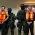 **  CORRECTS CAPTION TO REMOVE THE LAST TWO SENTENCES AND THE SECOND BYLINE  ** Saul Solis Solis, right, and Mario Alberto Gordillo, alleged members of Mexico's Knights Templar drug cartel, are escorted by soldiers upon their presentation to the media in Mexico City, Tuesday, Sept. 20, 2011. Solis Solis, a former police chief and one-time congressional candidate, and Gordillo were captured Monday  in the cartel's home state of Michoacan, Mexico. (AP Photo/str)