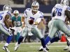 Dallas Cowboys quarterback Stephen McGee (7) hands the ball to Lance Dunbar (25) during the first half of a preseason NFL football game against the Miami Dolphins, Wednesday, Aug. 29, 2012, in Arlington, Texas. (AP Photo/Tony Gutierrez)
