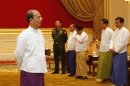 Myanmar President Thein Sein and ministers wait for UN Secretary-General Ban at the Presidential Palace in Naypyitaw