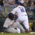 Detroit Tigers' Prince Fielder is doubled up off first base by Kansas City Royals first baseman Billy Butler, after Delmon Young popped out during the third inning of a baseball game at Kauffman Stadium in Kansas City, Mo., Tuesday, Oct. 2, 2012. (AP Photo/Orlin Wagner)
