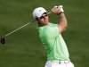 Paul Casey of England plays a ball on the 10th hole during the first round of the Desert Classic Golf tournament in Dubai, United Arab Emirates, Thursday, Jan. 31, 2013. (AP Photo/Kamran Jebreili)