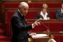 French Foreign Minister Fabius delivers a speech during a debate on Palestine status at the National Assembly in Paris