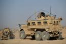 US Marines operate Mine Resistant Ambush Protected (MRAP) vehicles in Afghanistan in June 2012