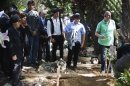 Relatives and friends attend the funeral of Marc Rich at Kibbutz Einat cemetery near Tel Aviv