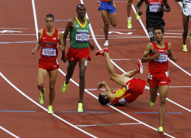 Spain's Diego Ruiz falls during the men's 1500m round 1 event at the London 2012 Olympic Games in the Olympic Stadium