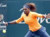Serena Williams returns to Mallory Burdette at the Family Circle Cup tennis tournament in Charleston, S.C., Friday, April 5, 2013. (AP Photo/Mic Smith)