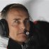 McLaren Formula One team principal Whitmarsh looks from the pit wall during the qualifying session of the Chinese F1 Grand Prix at Shanghai International circuit