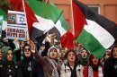 Protesters shout anti Israel slogans during a protest in front of a court house in Istanbul