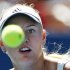 Caroline Wozniacki of Denmark, watches a ball hit by Nuria Llagostera Vives of Spain,  during the first round of the U.S. Open tennis tournament in New York, Tuesday, Aug. 30, 2011. (AP Photo/Mike Groll)