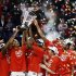 Ohio State players celebrate after winning an NCAA college basketball game against Wisconsin in the championship of the Big Ten tournament Sunday, March 17, 2013, in Chicago. Ohio State won 50-43. (AP Photo/Charles Rex Arbogast)
