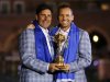 Team Europe golfer Garcia holds the Ryder Cup with captain Olazabal after the closing ceremony of the 39th Ryder Cup at the Medinah Country Club