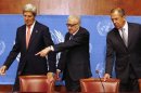 U.S. Secretary of State Kerry, U.N. Special Representative Brahimi, and Russian Foreign Minister Lavrov, find seats before they speak to media after meeting on crisis in Syria, at United Nations offices in Geneva