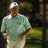 Fred Couples reacts to missing a bogey putt on the seventh green during third round play in the 2013 Masters golf tournament in Augusta